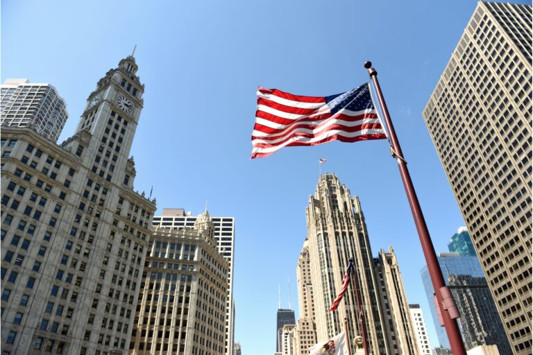 American flag waving in downtown of Chicago